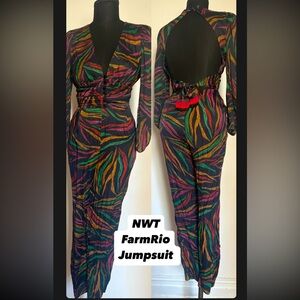 Farm Rio multi colored zebra print jumpsuit with open back. Size small NWT